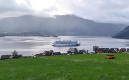 Cruise ship docked at the port of Rosendal, Norway