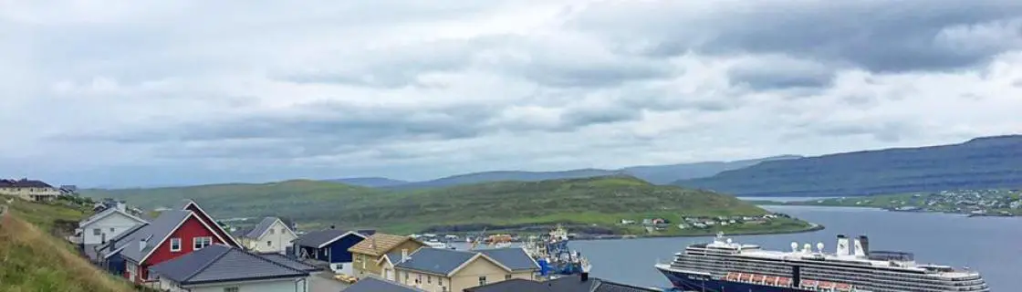 cruise ship docked at the port of Runavik, Faroe Islands